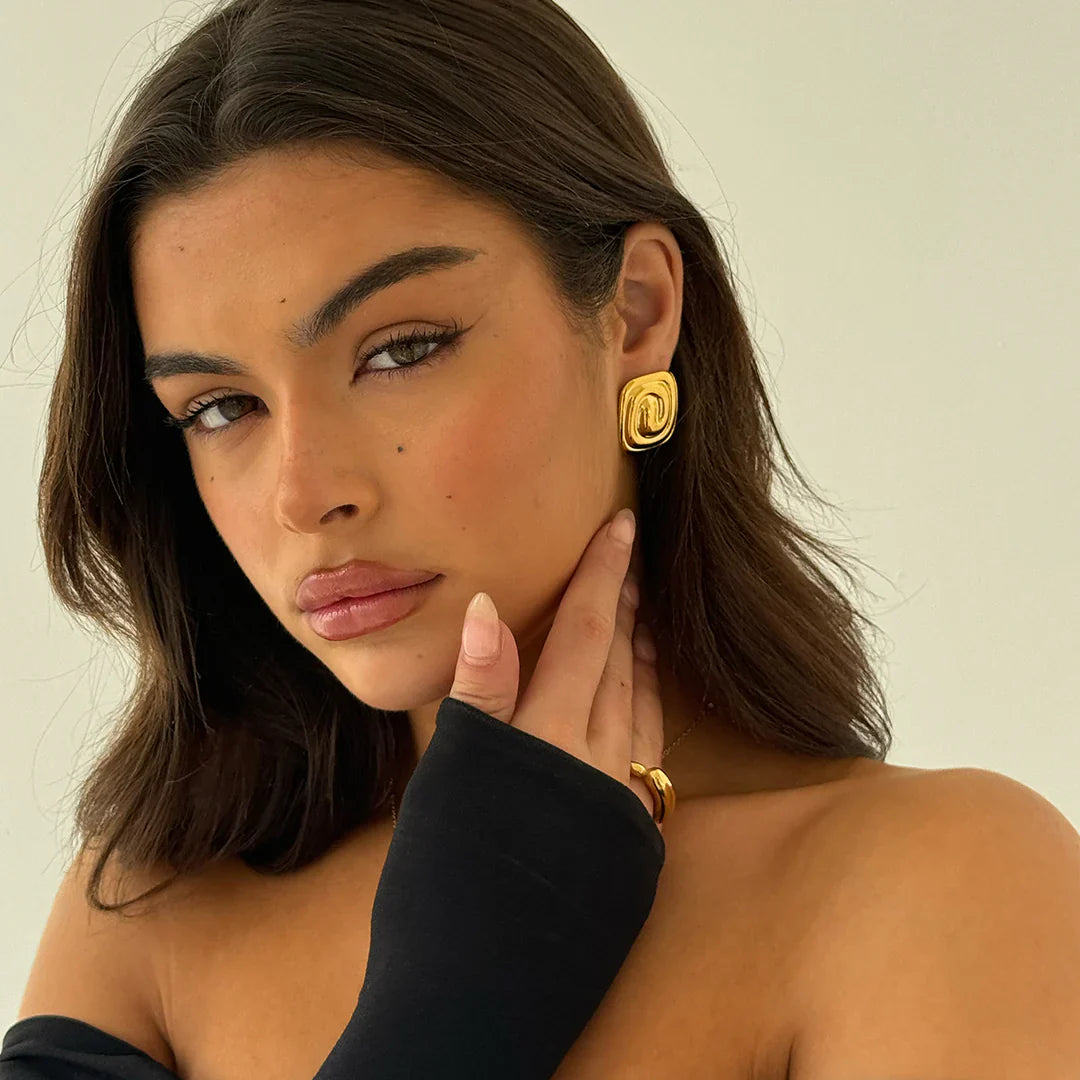 Boucles d'oreilles torsadées en or