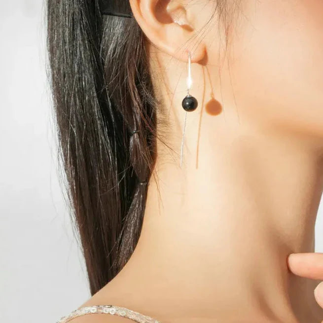 Boucles d'oreilles pendantes noires intemporelles