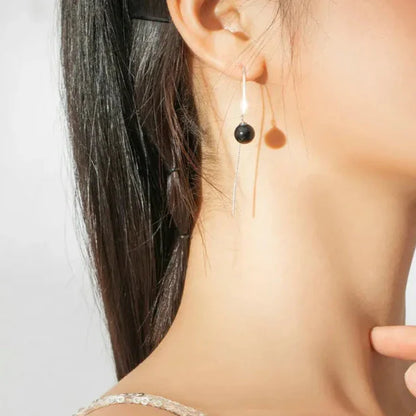 Boucles d'oreilles pendantes noires intemporelles