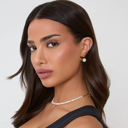 Boucles d'oreilles en or ornées de perles