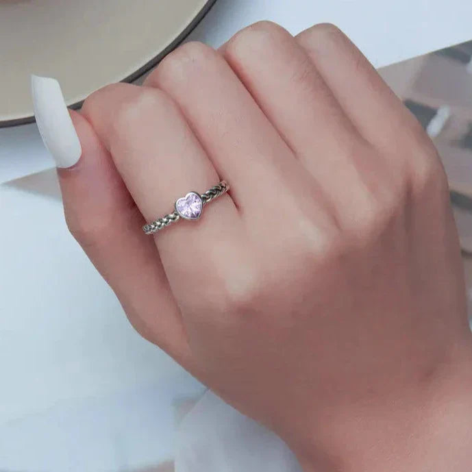 Bague torsadée cœur rose
