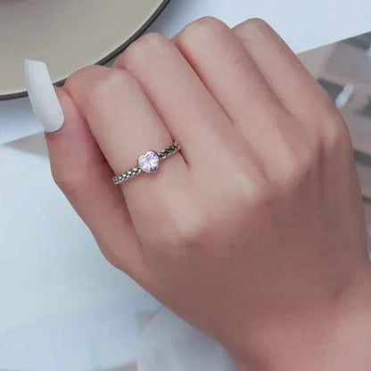 Bague torsadée cœur rose